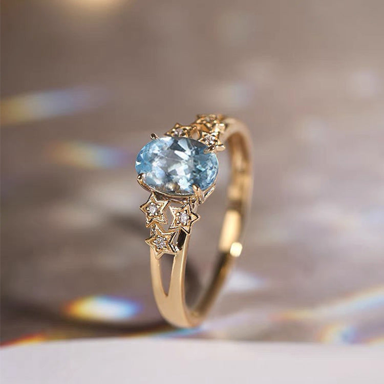 Anello in oro esclusivo con cristallo blu