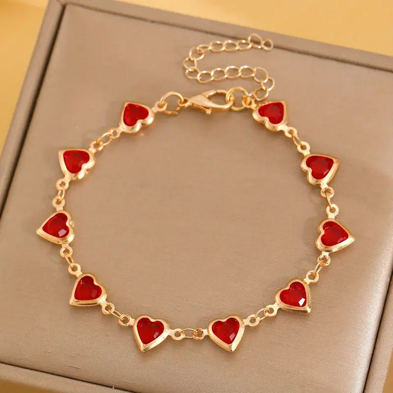 Bracciale a cuore in rubino dorato