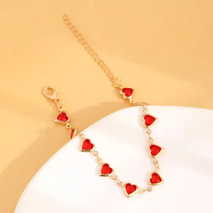 Bracciale a cuore in rubino dorato