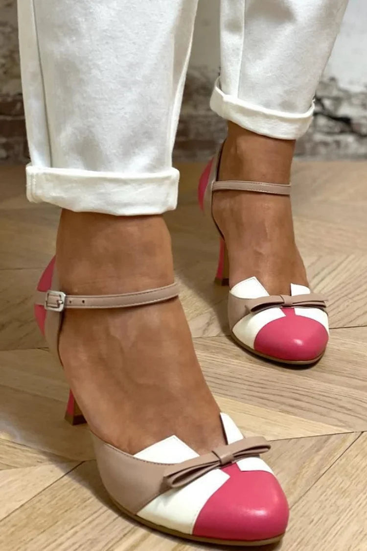 Tacchi a spillo fucsia color block con fiocco e punta rotonda