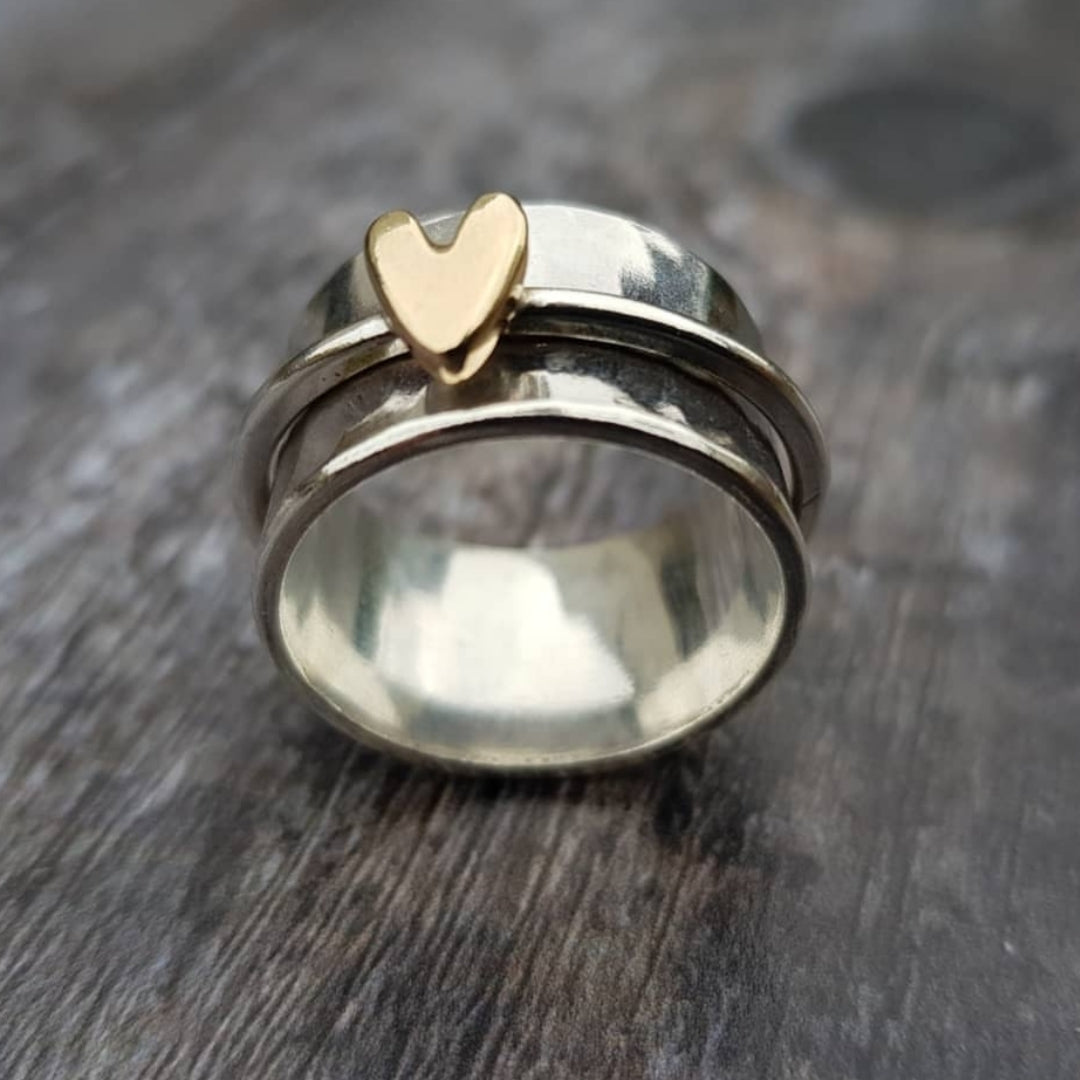 Anello in argento con cuore in oro