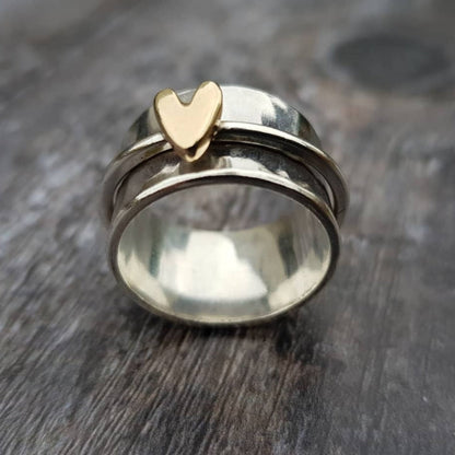 Anello in argento con cuore in oro