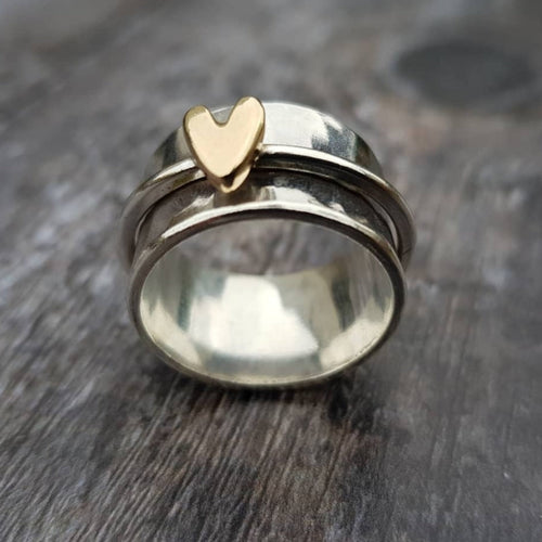 Anello in argento con cuore in oro