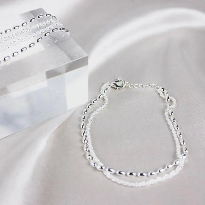 Set di bracciali eleganti in argento con zirconia cubica