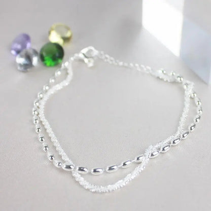 Set di bracciali eleganti in argento con zirconia cubica