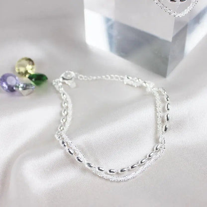 Set di bracciali eleganti in argento con zirconia cubica