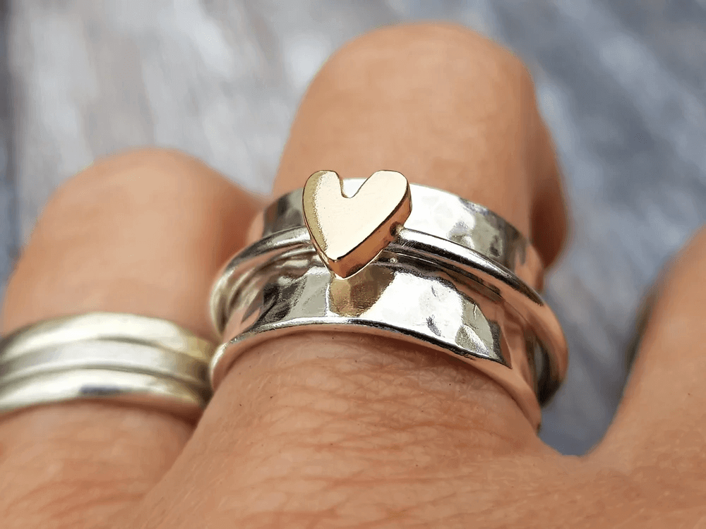 Anello in argento con cuore in oro
