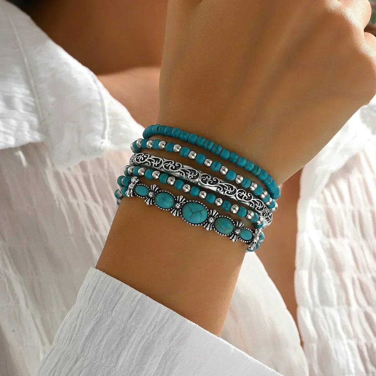 Set di bracciali con perle turchesi