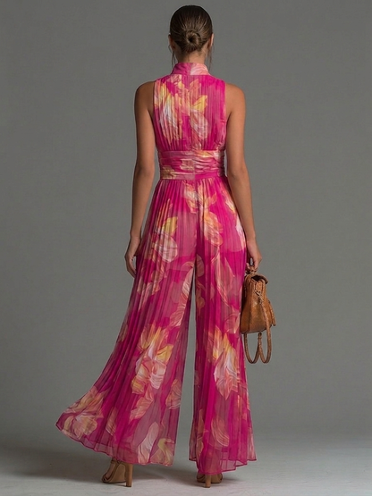 Tuta Serafina | Chiffon Plissettato Fucsia con Fiori